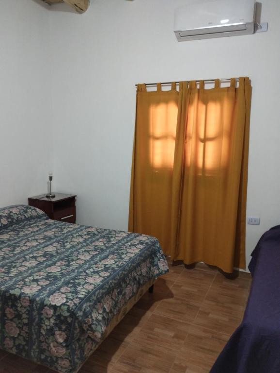 Postel nebo postele na pokoji v ubytování Cabaña La Angostura