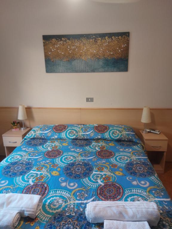 Postel nebo postele na pokoji v ubytování Hotel Villa Grazia