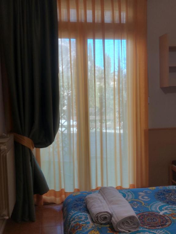 Postel nebo postele na pokoji v ubytování Hotel Villa Grazia
