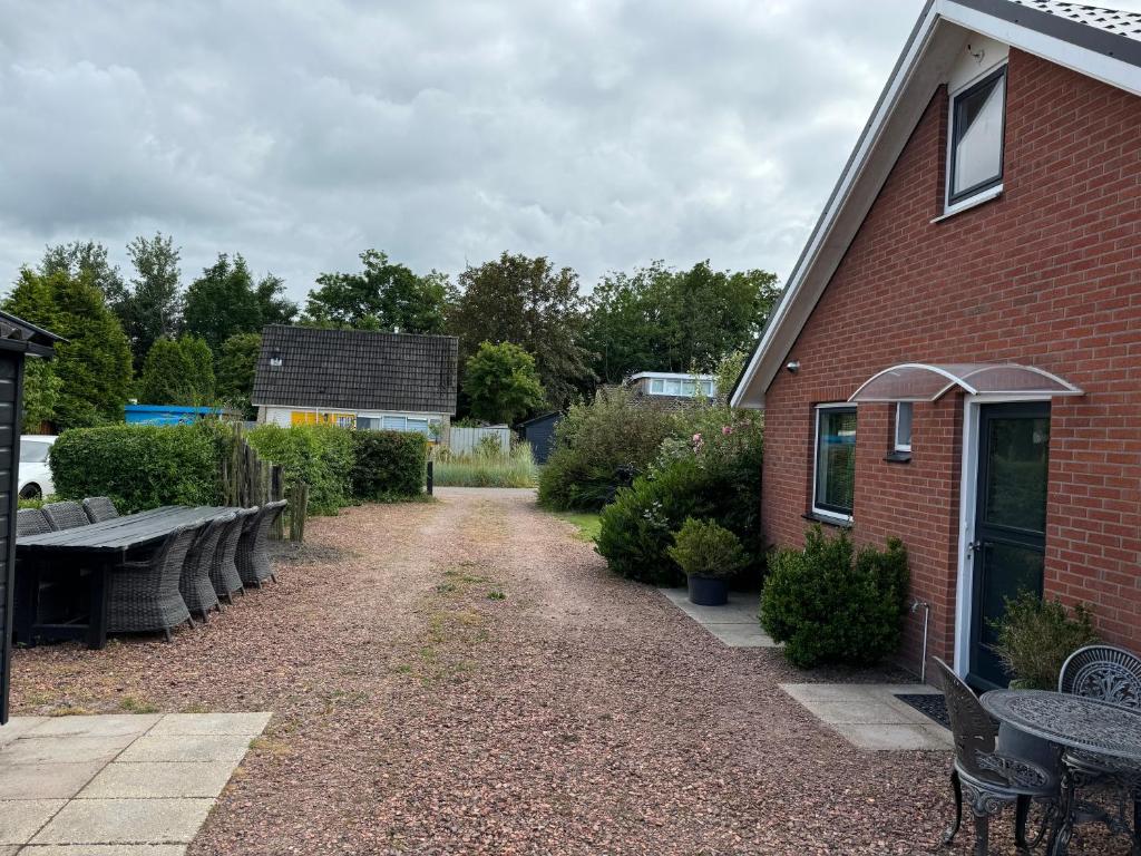 Zahrada ubytování 5 persoons vakantiewoning Robbenoort 50 Lauwersoog