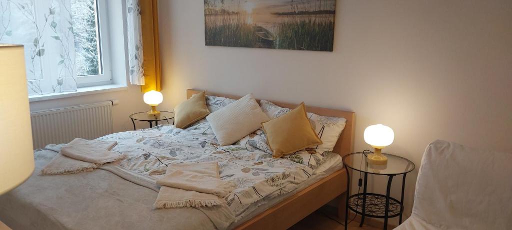 Postel nebo postele na pokoji v ubytování Atom apartment