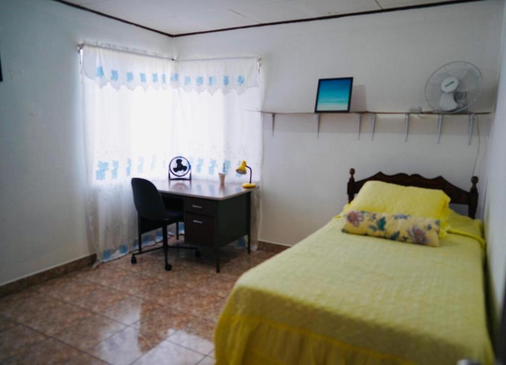 Postel nebo postele na pokoji v ubytování Pura Vida Tico Casita