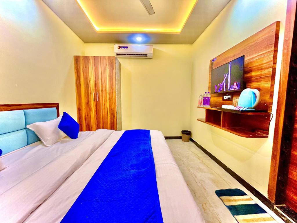 Postel nebo postele na pokoji v ubytování Hotel Agra YS Taj Hotel