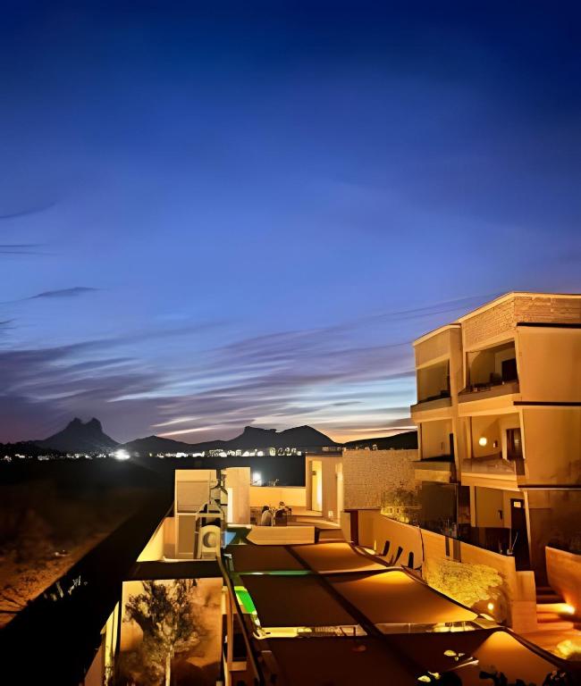 a view from the balcony of a building at night at Condominios Evamar San Carlos in San Carlos