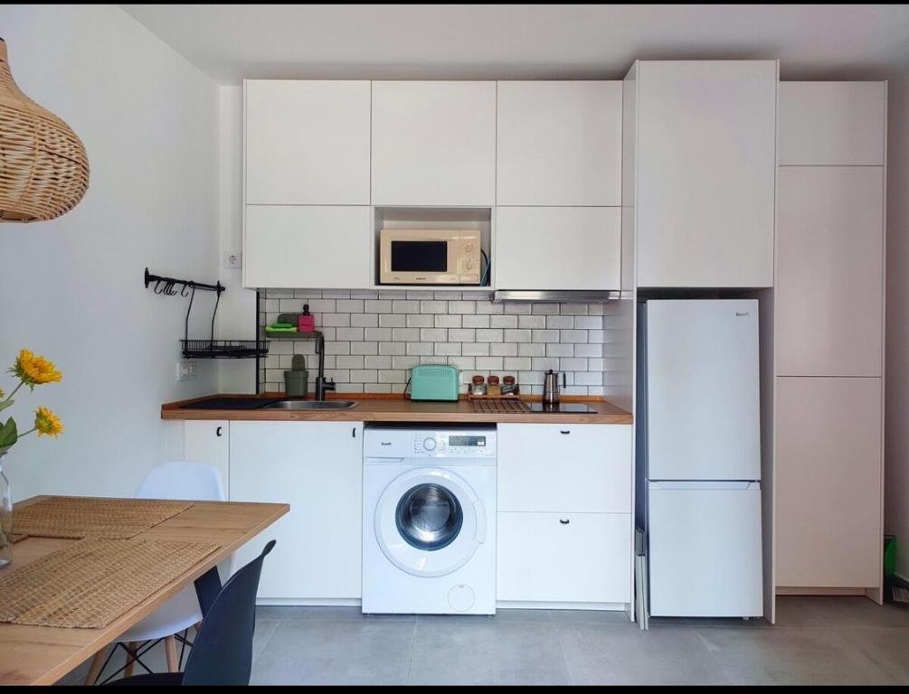 Kuchyň nebo kuchyňský kout v ubytování Estudio Alamillo 1