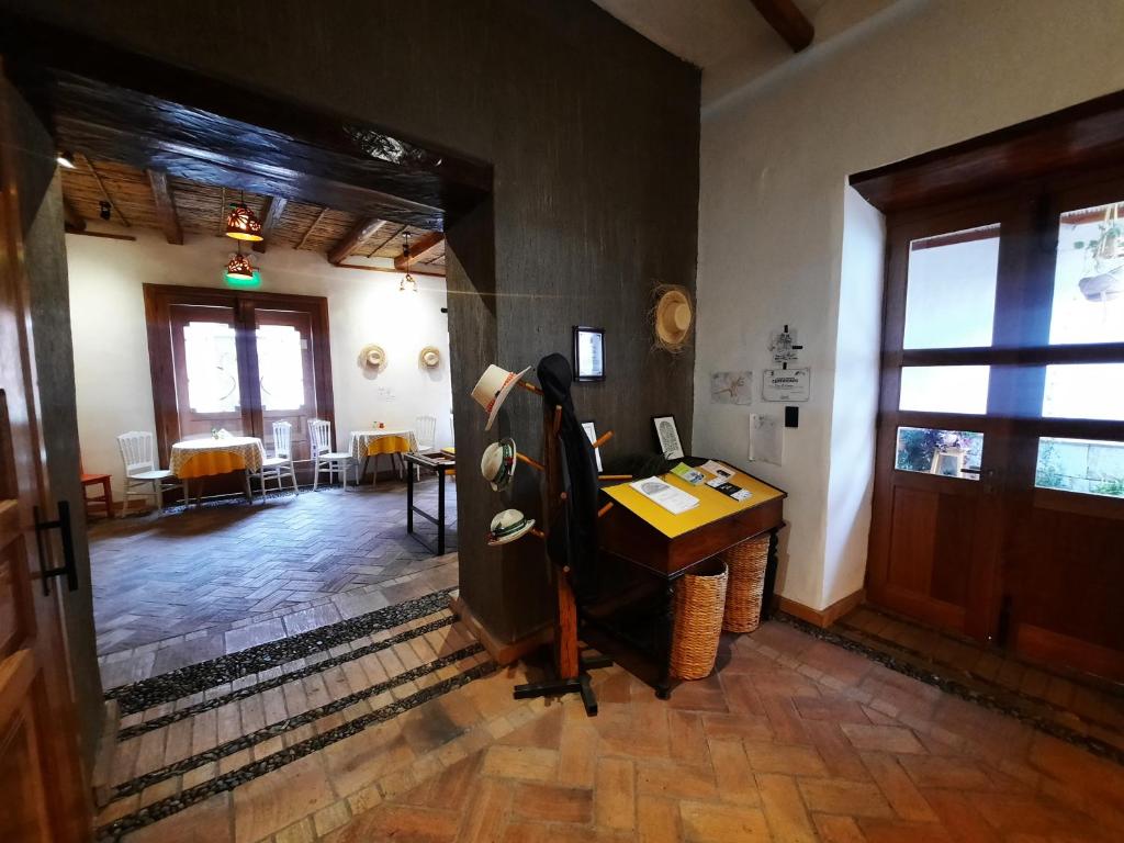 TV a/nebo společenská místnost v ubytování Hostal Suite Le Fabrique