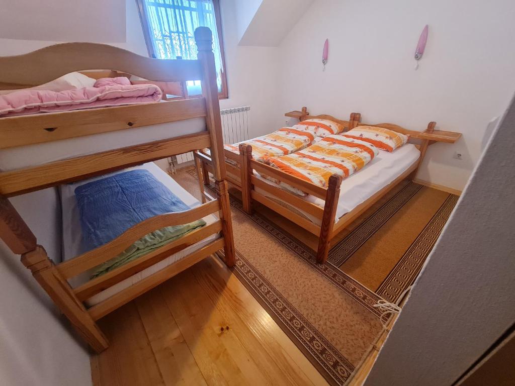 Rúm í herbergi á EAA Vlašić