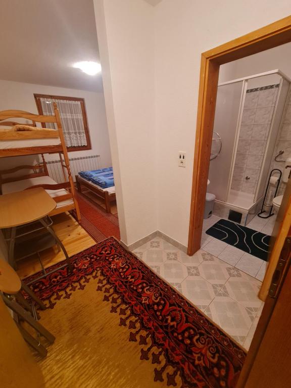 Rúm í herbergi á EAA Vlašić