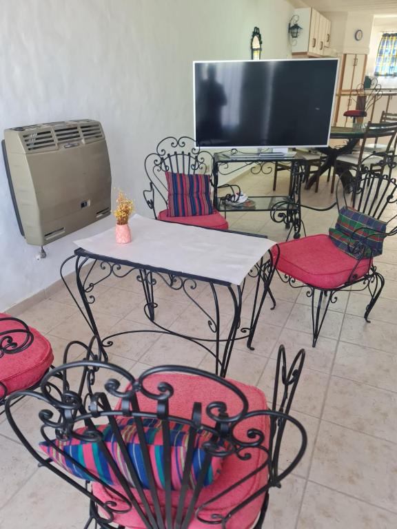 Televiisor ja/või meelelahutuskeskus majutusasutuses Duplex 4pax Playa Unión