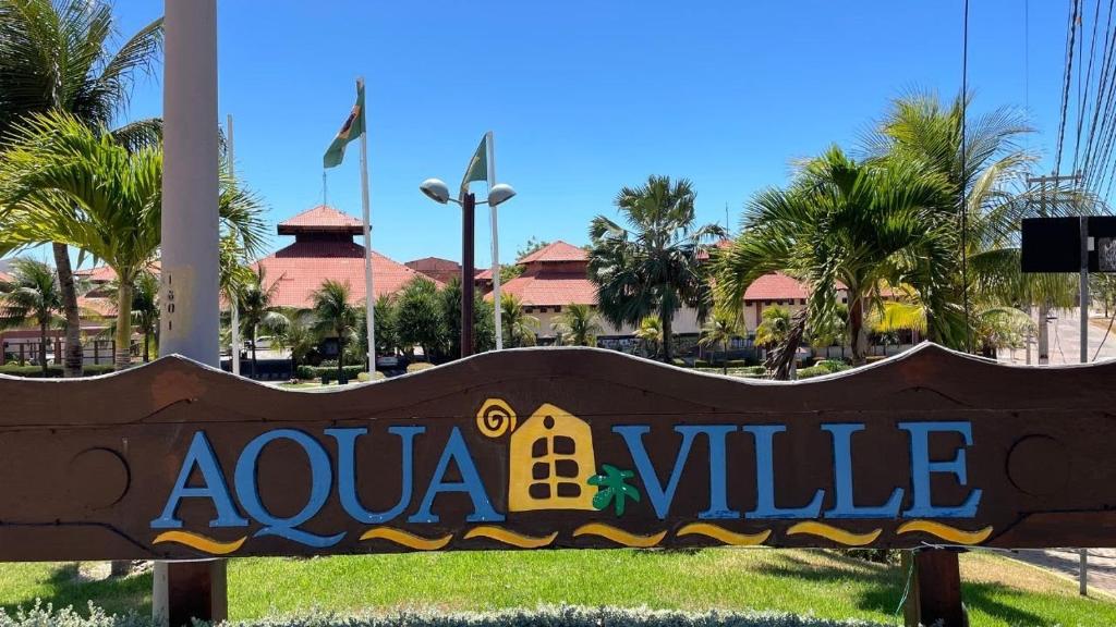 Et logo, certifikat, skilt eller en pris der bliver vist frem på Apartamento Aquaville Resort