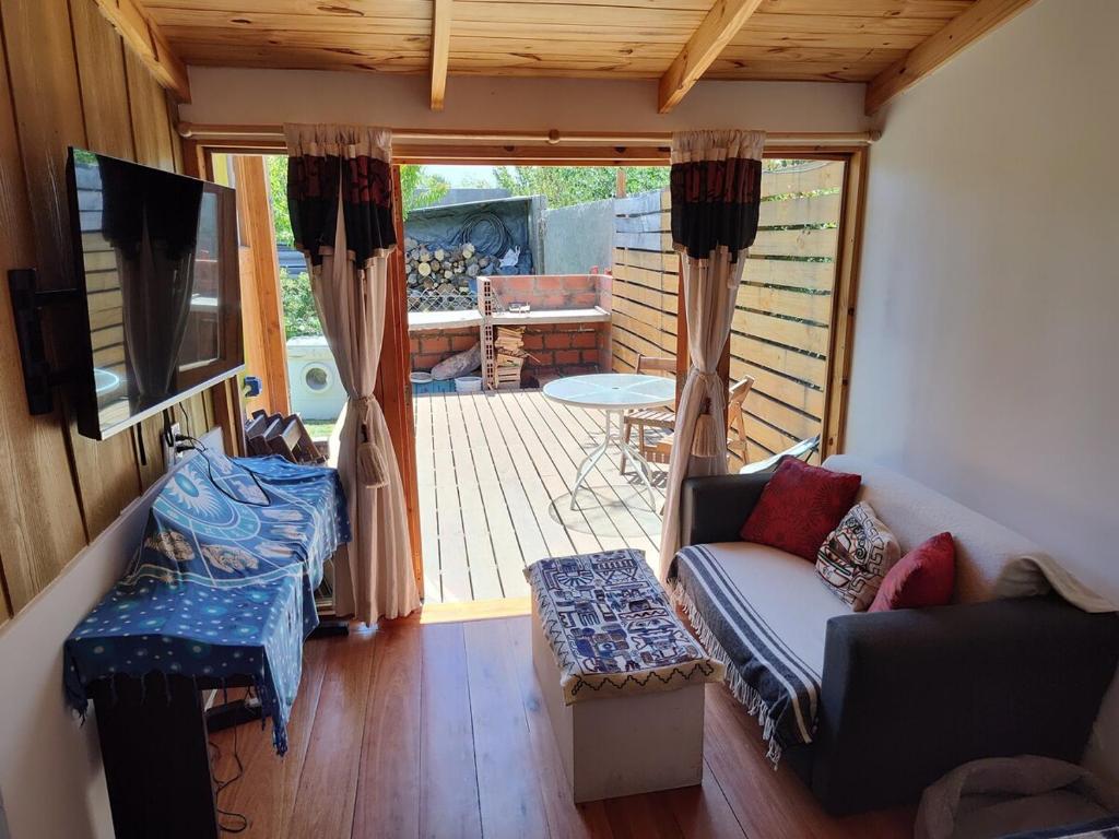 Posezení v ubytování Cabaña Jardín del Río