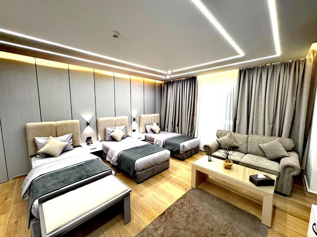 Posezení v ubytování Queens Suite Hotel