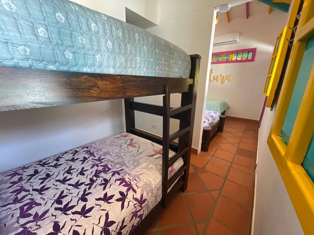 Postel nebo postele na pokoji v ubytování Hotel El Remanso Cartago