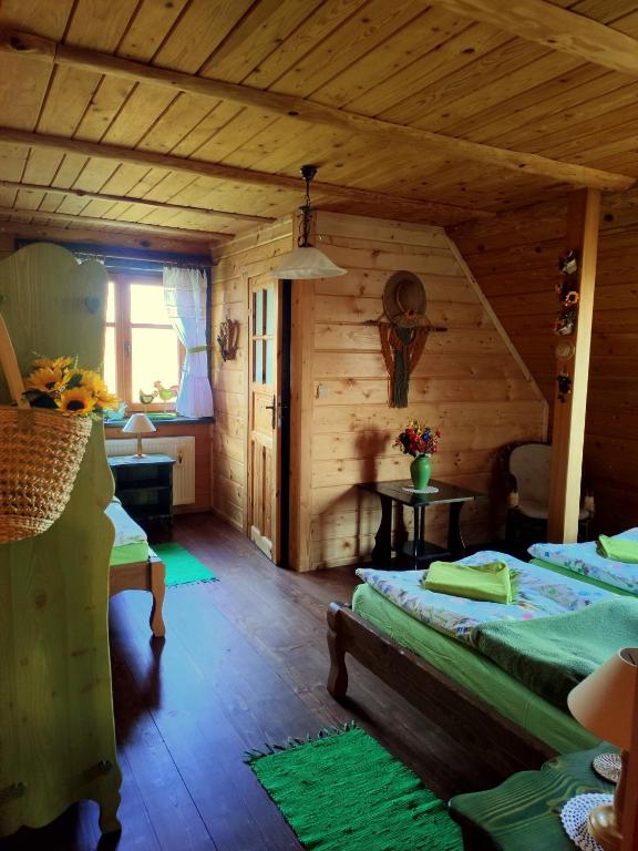 Postel nebo postele na pokoji v ubytování Agroturystyka Zadnie Łuki