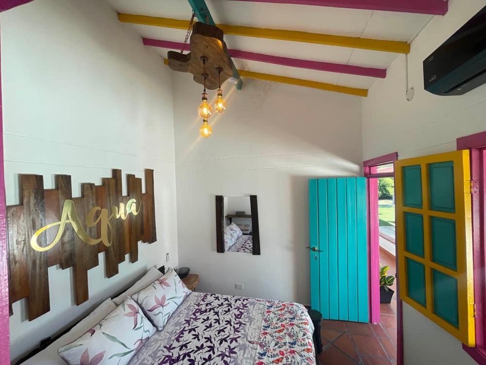Postel nebo postele na pokoji v ubytování Hotel El Remanso Cartago