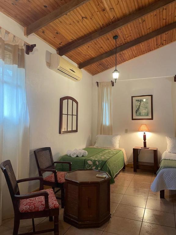 Postel nebo postele na pokoji v ubytování Kakao Lodge & Garden Río Celeste