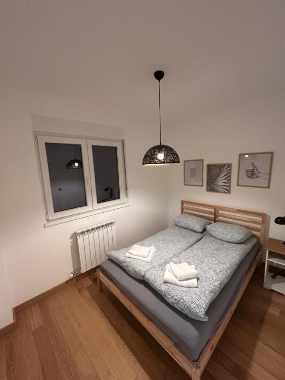 Postel nebo postele na pokoji v ubytování Krfska Lux by Magenta