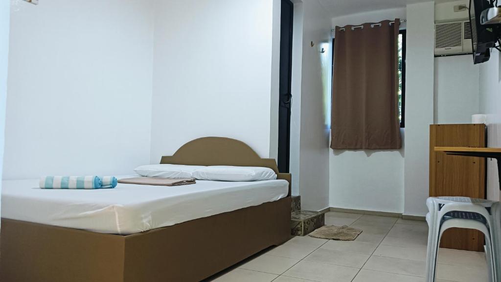 Postel nebo postele na pokoji v ubytování Alona Guest House