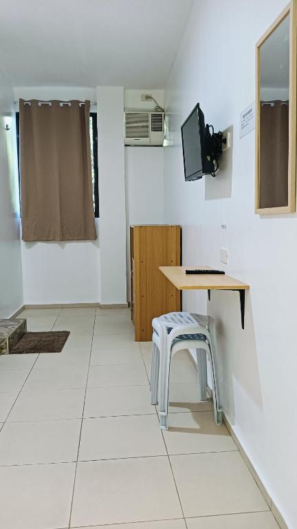 TV a/nebo společenská místnost v ubytování Alona Guest House