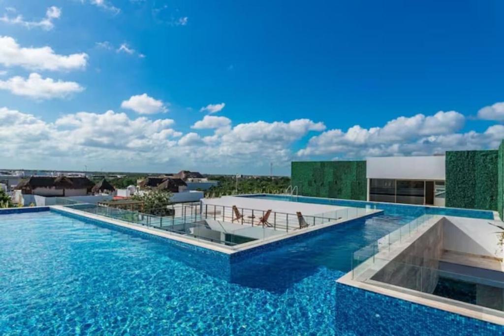 Πισίνα στο ή κοντά στο Condo in Aldea Zama 6 mins from Downtown Tulum