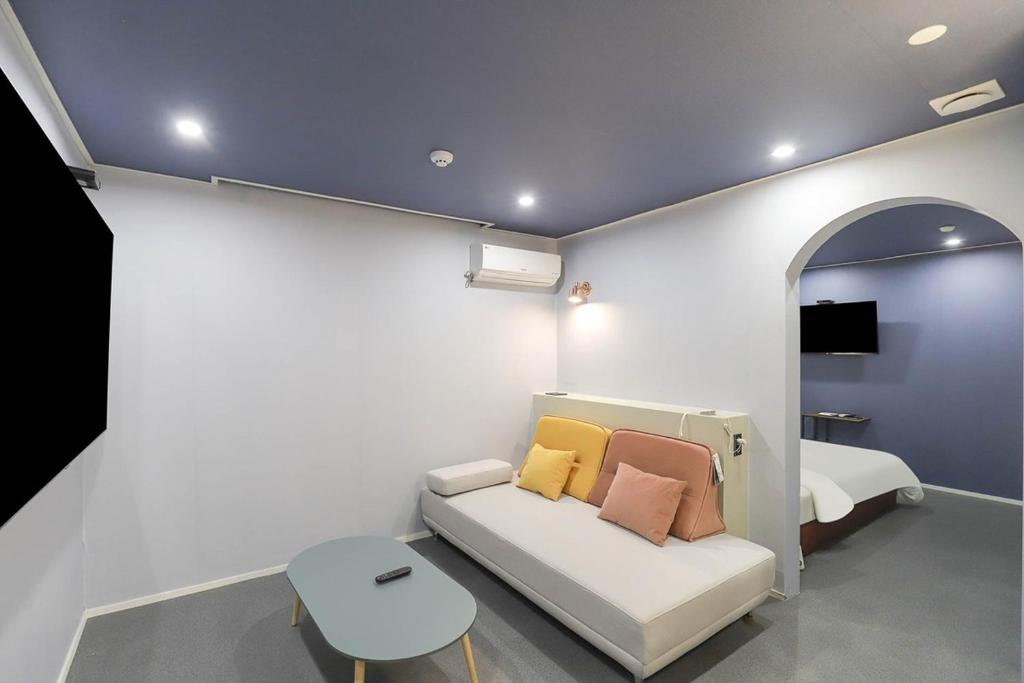 Postel nebo postele na pokoji v ubytování Hotel Stay Q Daejeon