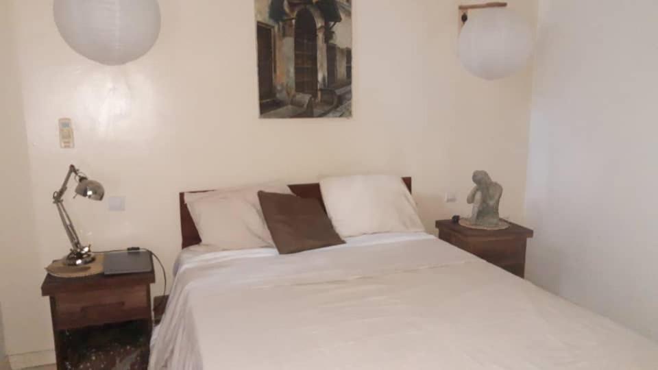 Letto o letti in una camera di Le Dhow