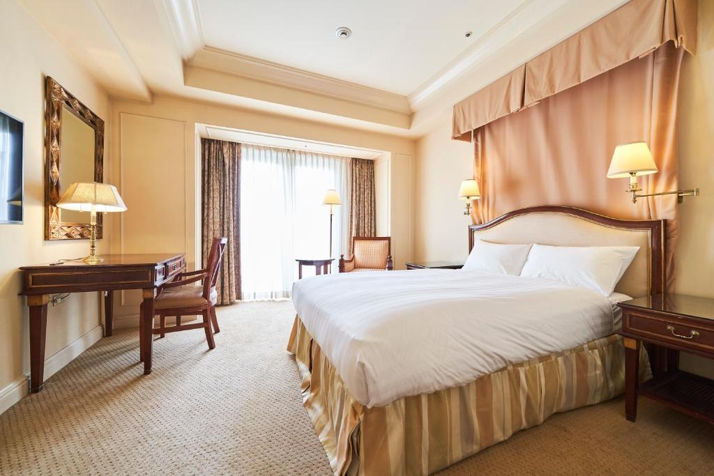 Postel nebo postele na pokoji v ubytování Hotel Grand Tiara Minaminagoya