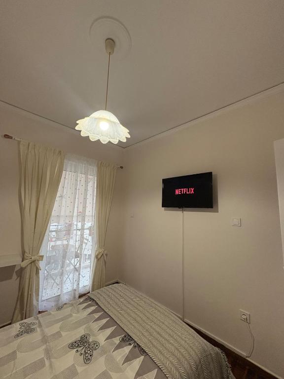 Postel nebo postele na pokoji v ubytování Apartment near Mikrolimano