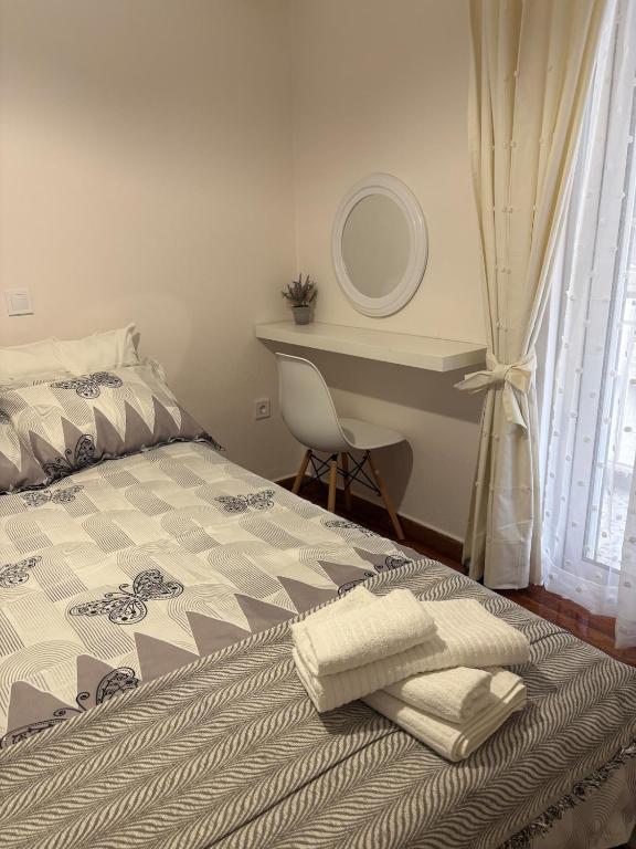 Postel nebo postele na pokoji v ubytování Apartment near Mikrolimano