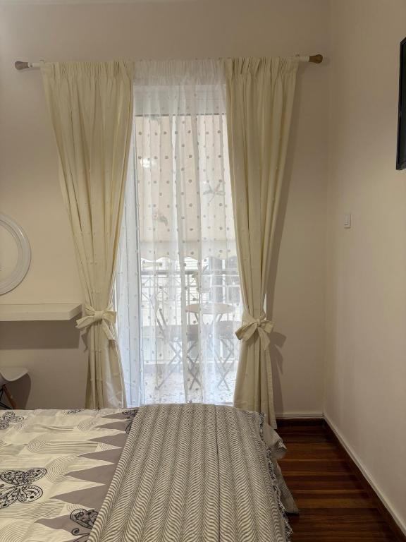 Postel nebo postele na pokoji v ubytování Apartment near Mikrolimano