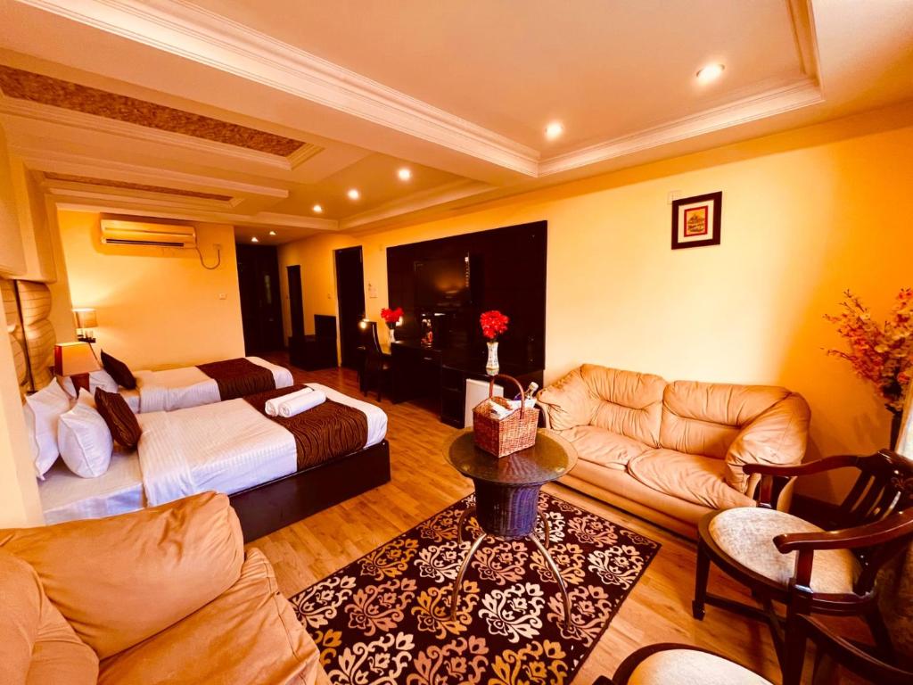 Postel nebo postele na pokoji v ubytování The Reo Lodge, Haridwar