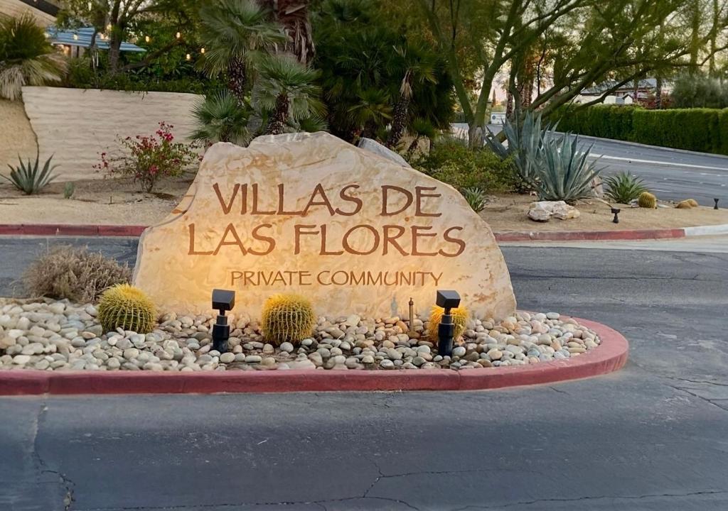 a sign for thelas de las flores private community at Charming 2-Bedroom Condo in Enchanting Palm Spring in Palm Springs