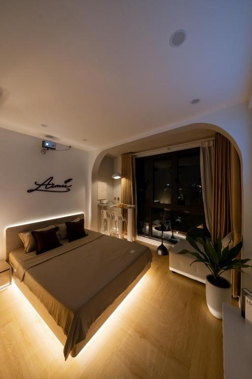 Postel nebo postele na pokoji v ubytování Aimee House Homestay Trấn Vũ