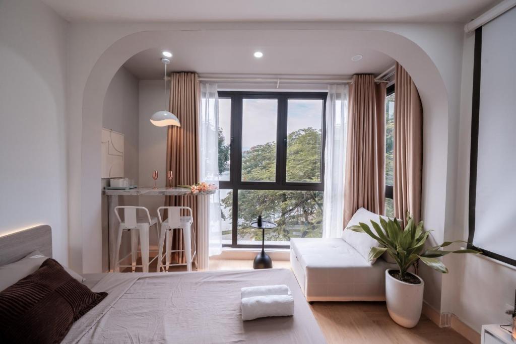 Postel nebo postele na pokoji v ubytování Aimee House Homestay Trấn Vũ
