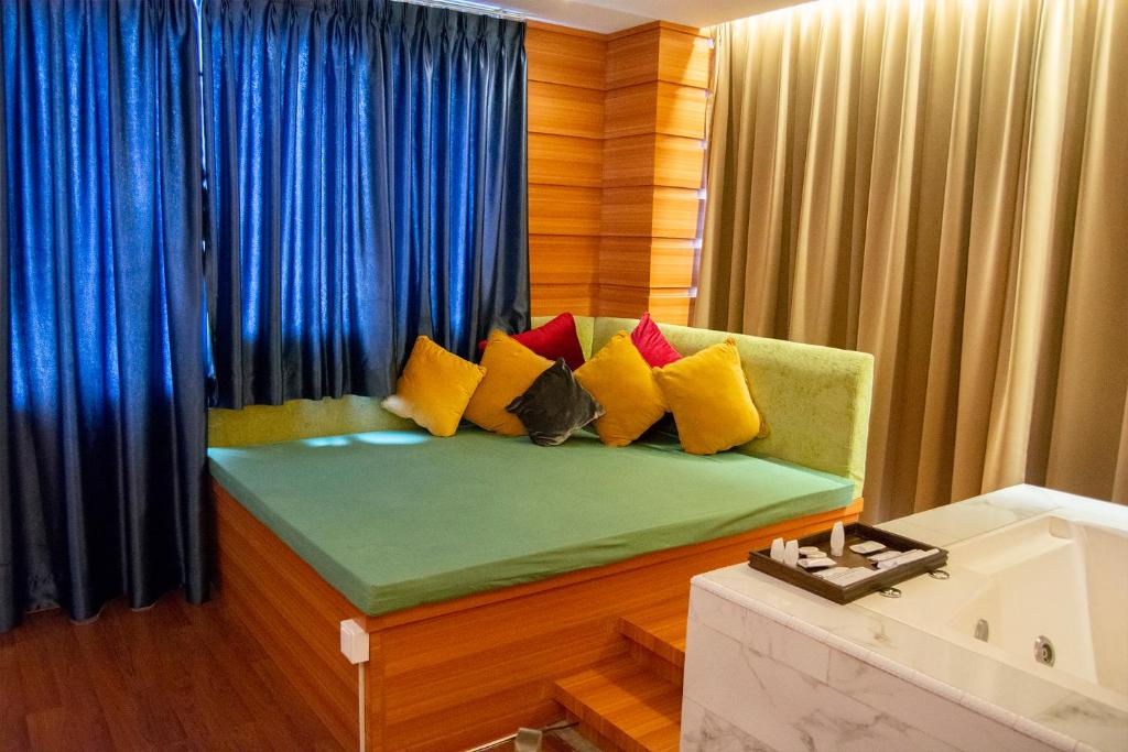 Posezení v ubytování Royal Asnof Hotel Pekanbaru