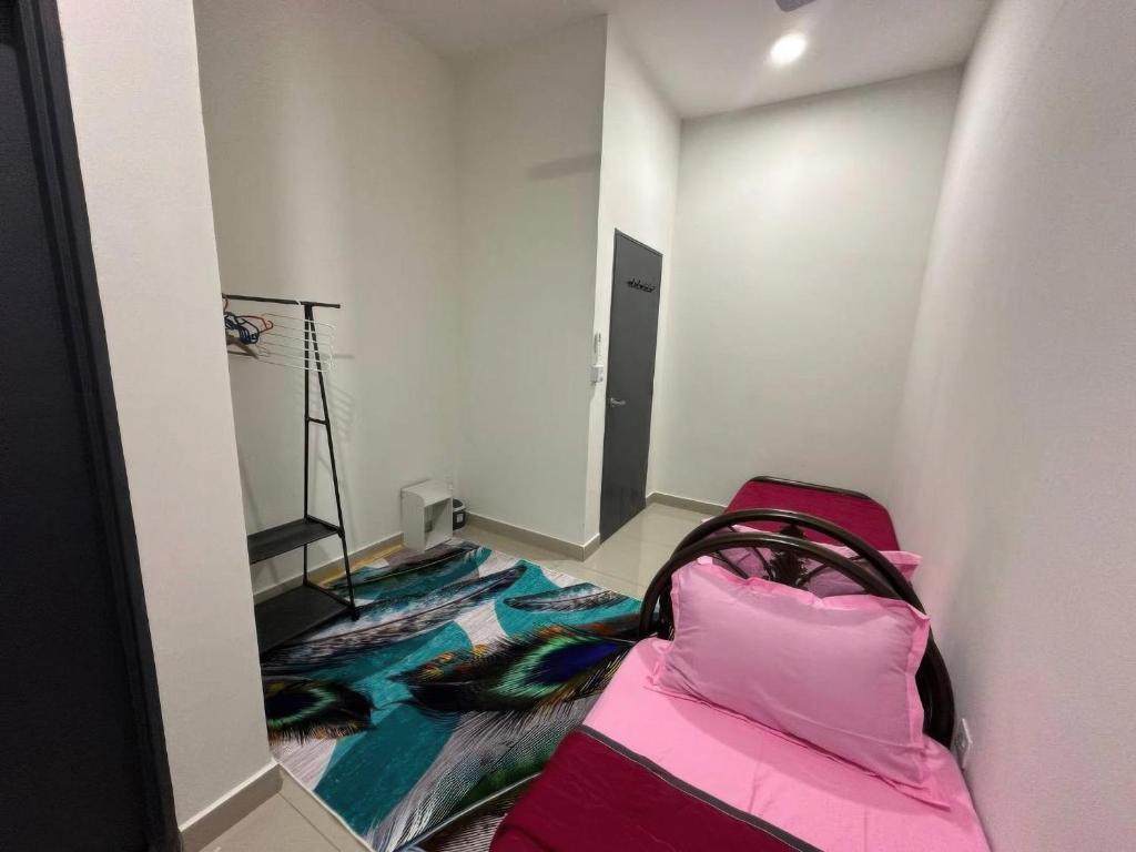 Postel nebo postele na pokoji v ubytování D'Sally Homestay KLIA Sepang