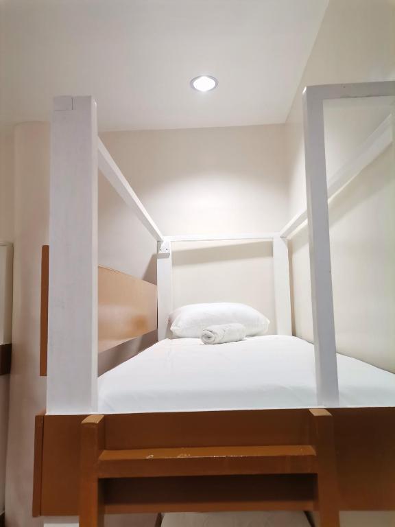 Postel nebo postele na pokoji v ubytování Viewpoint 360 Hotel