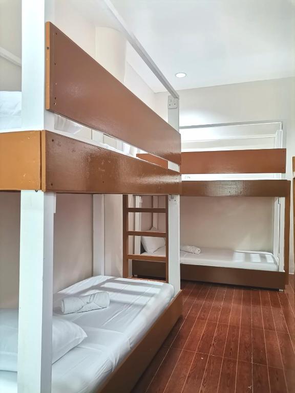 Postel nebo postele na pokoji v ubytování Viewpoint 360 Hotel