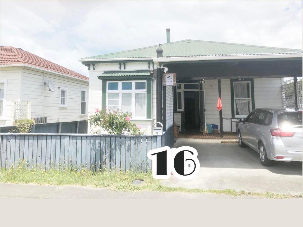 a house with a car parked in front of it at 十六号-2 in Gisborne