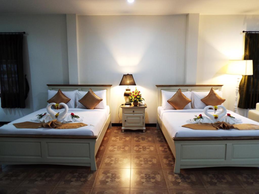 Cama o camas de una habitación en Phuwanalee Resort
