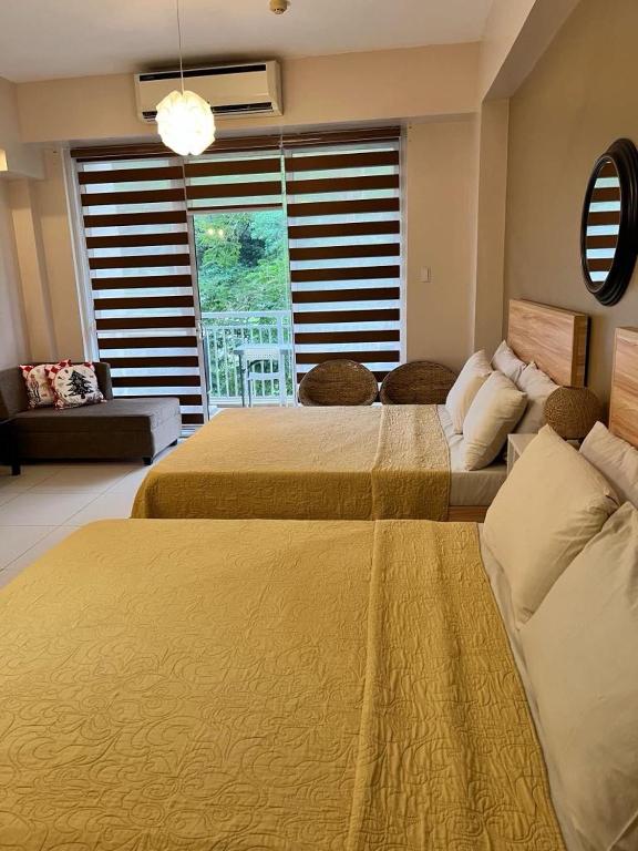 Postel nebo postele na pokoji v ubytování Luxurious Family Room Pico de Loro