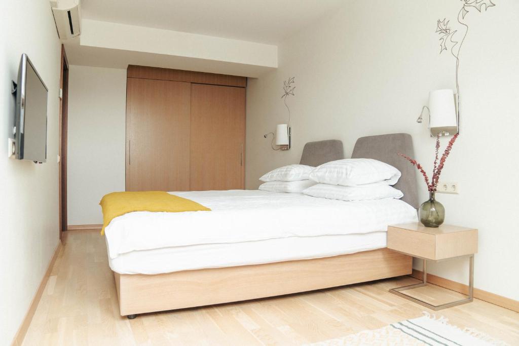 Postel nebo postele na pokoji v ubytování Mana Suites & Sea