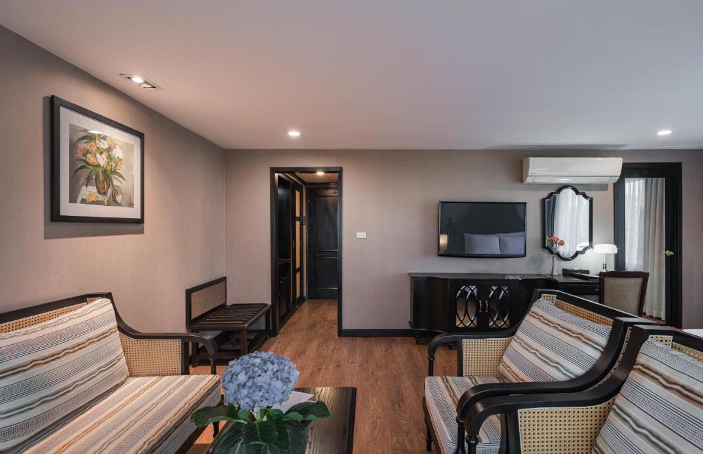 TV a/nebo společenská místnost v ubytování La Passion Classic Hotel