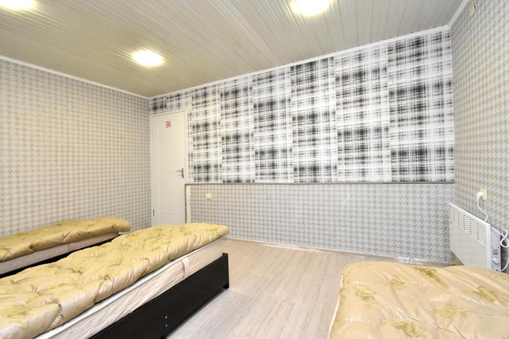 Postel nebo postele na pokoji v ubytování Canyon Hostel City Center