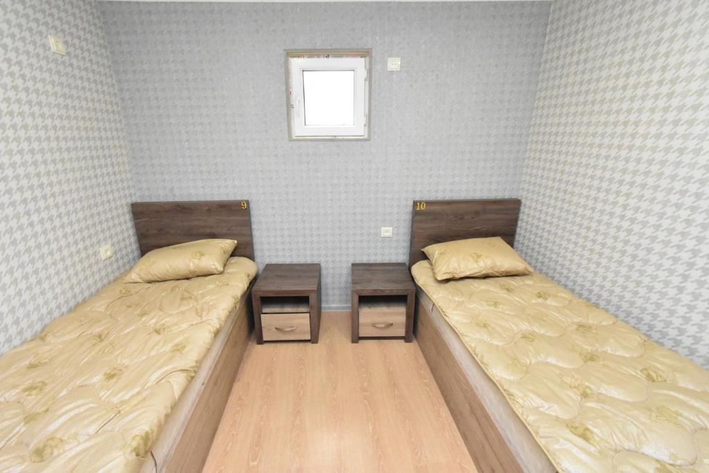 Postel nebo postele na pokoji v ubytování Canyon Hostel City Center