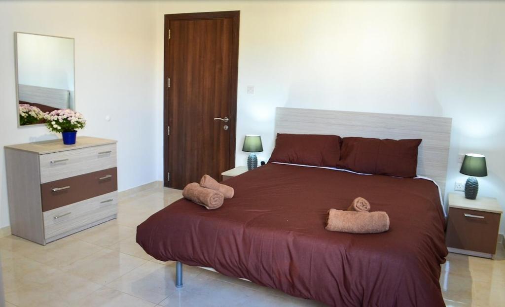 Postel nebo postele na pokoji v ubytování Msida Classic Flat 13, close to Valletta, Sliema & Sea