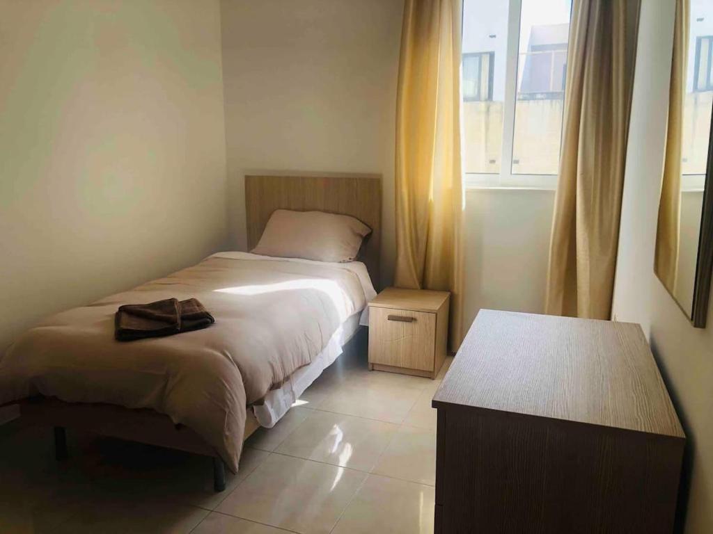 Postel nebo postele na pokoji v ubytování Msida Classic Flat 13, close to Valletta, Sliema & Sea