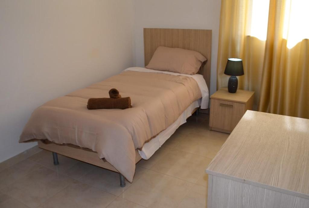 Postel nebo postele na pokoji v ubytování Msida Classic Flat 13, close to Valletta, Sliema & Sea