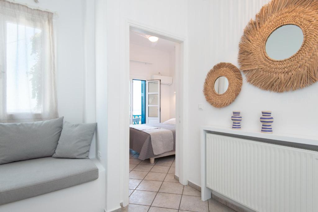 Postel nebo postele na pokoji v ubytování Anthousa Hotel