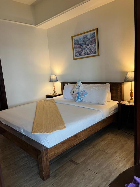 Postel nebo postele na pokoji v ubytování RESORT SUITES AT BARJAYA TIMES SQUARE kL